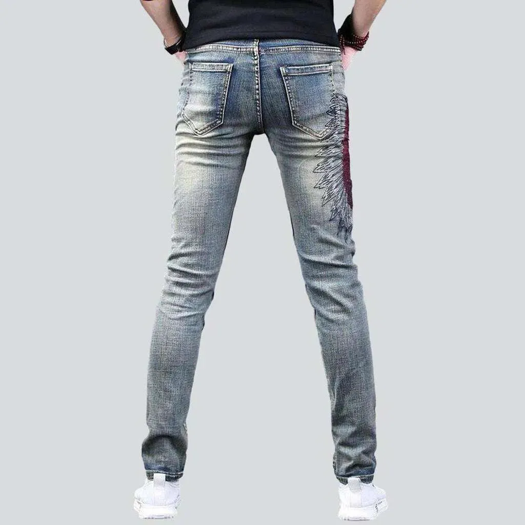 Jeans embroidered with indian