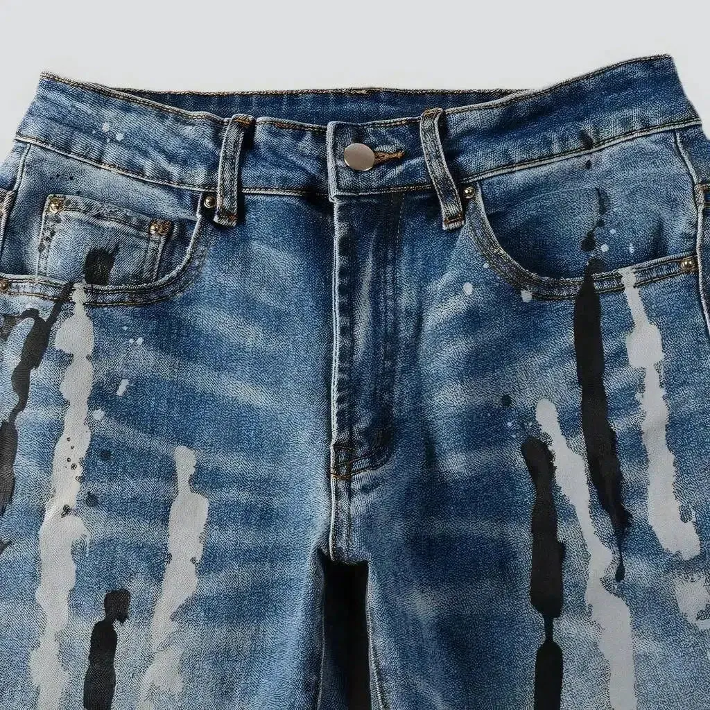 Painted men's light-wash jeans